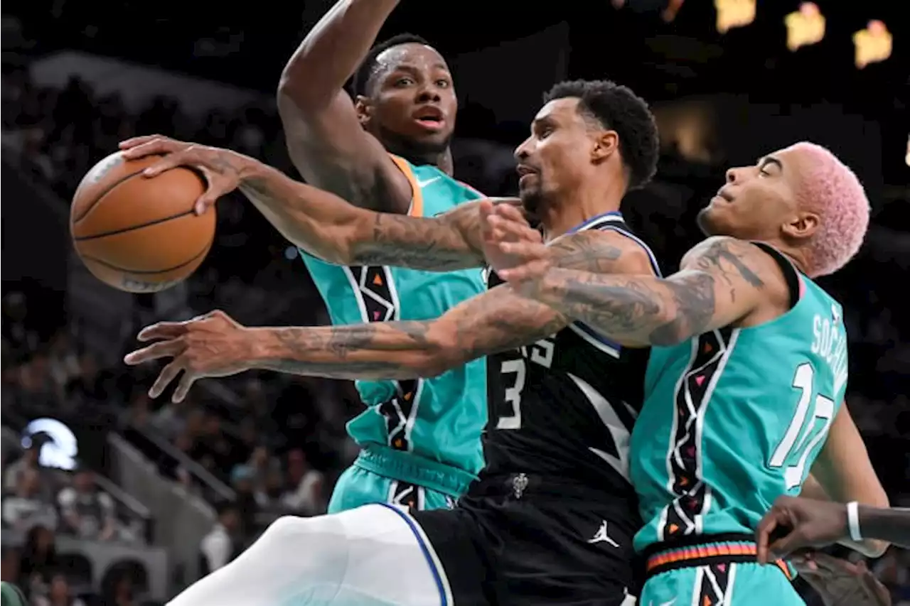 Johnson leads Spurs past injury-riddled Bucks 111-93