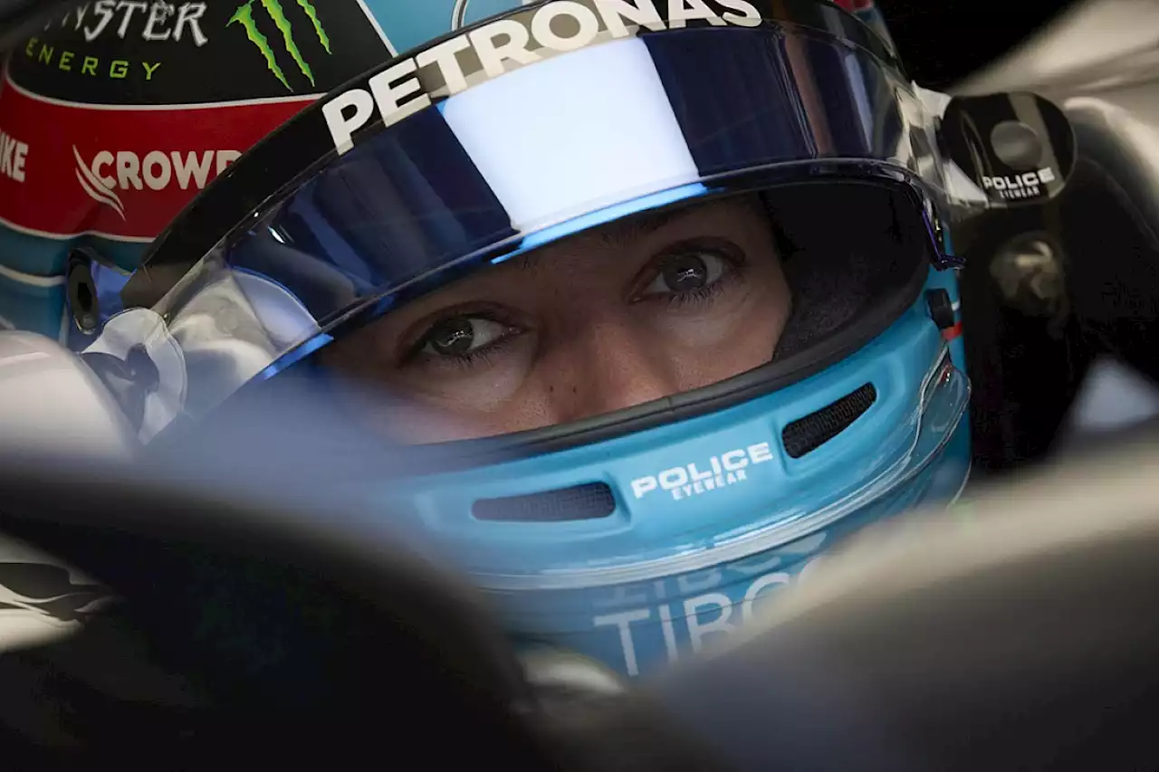 Russell's helmet broke headrest after gravel trap battering