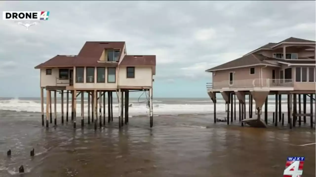 Teams surveying damage at St. Johns County beaches, measuring coastal erosion after Nicole