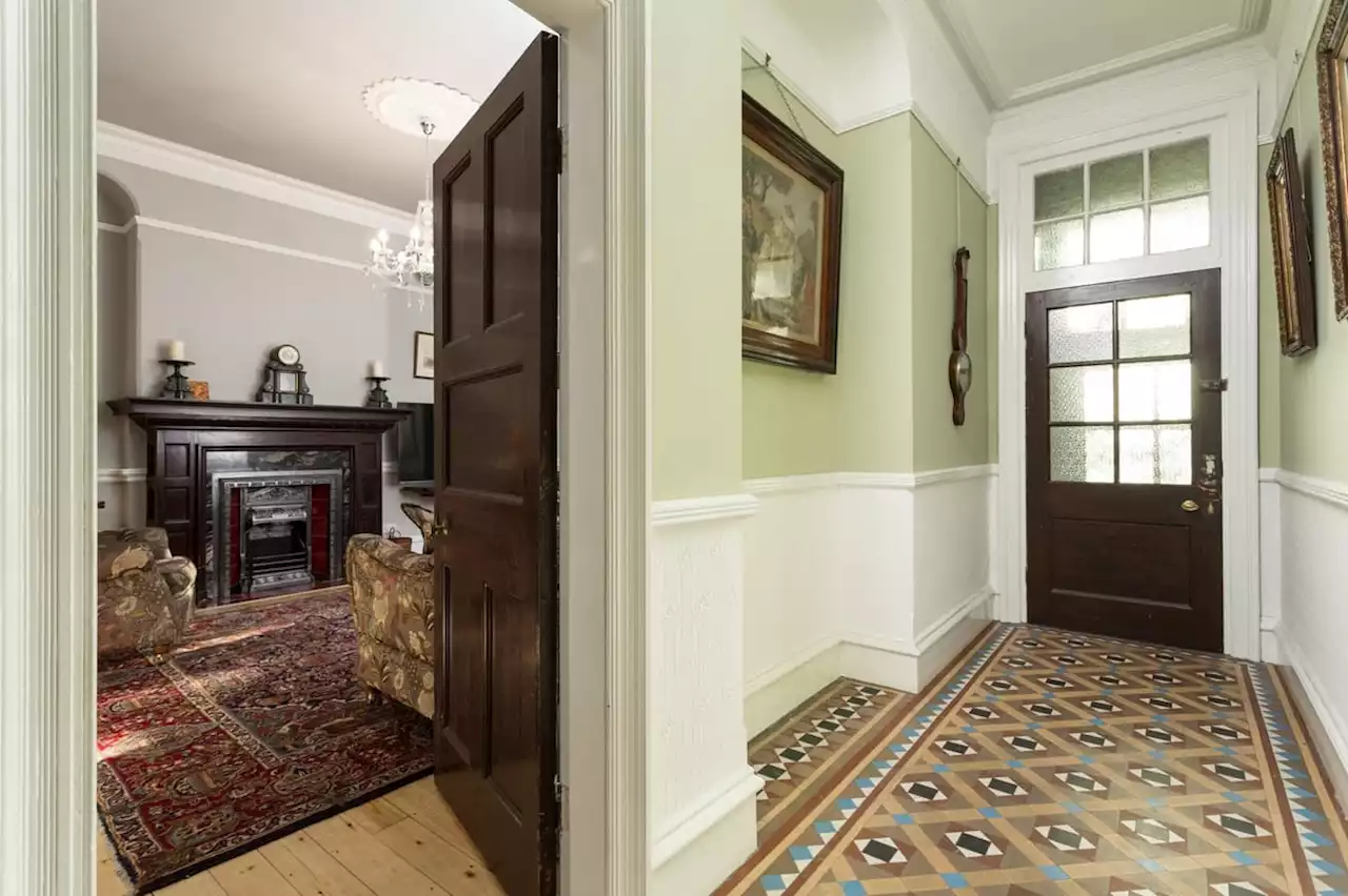 This remarkable Victorian home is for sale and has been treated to a hands-on restoration by historic house enthusiasts