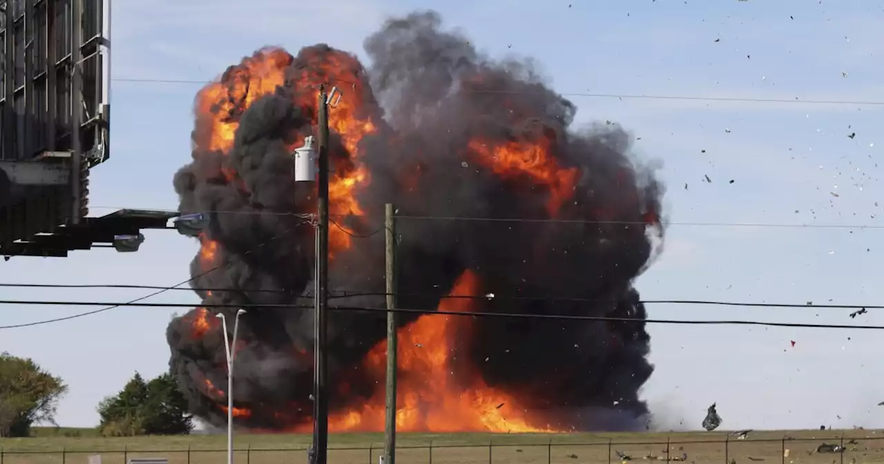 Two airplanes collide during Veterans Day air show in Dallas