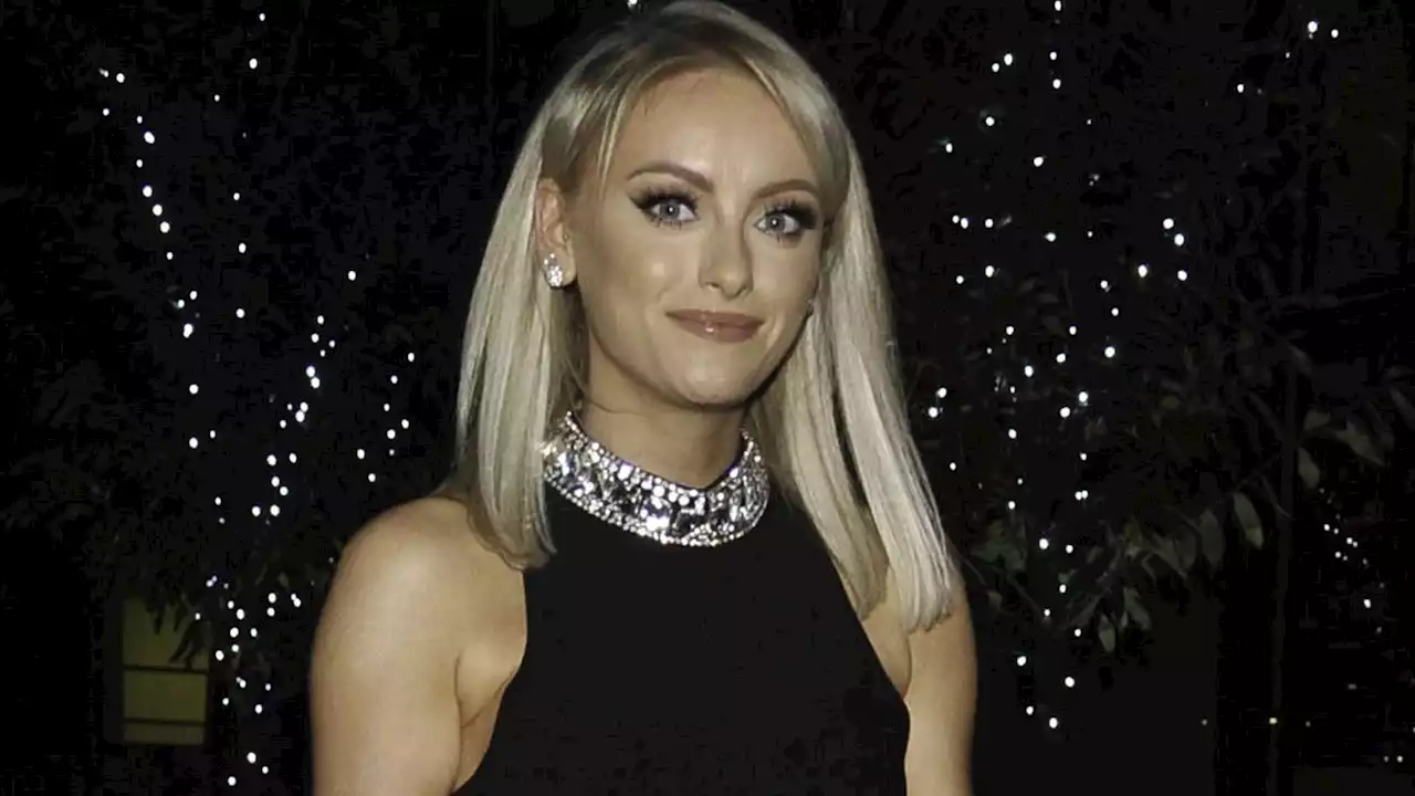 Katie McGlynn flashes her toned leg in thigh-split dress on glam night out