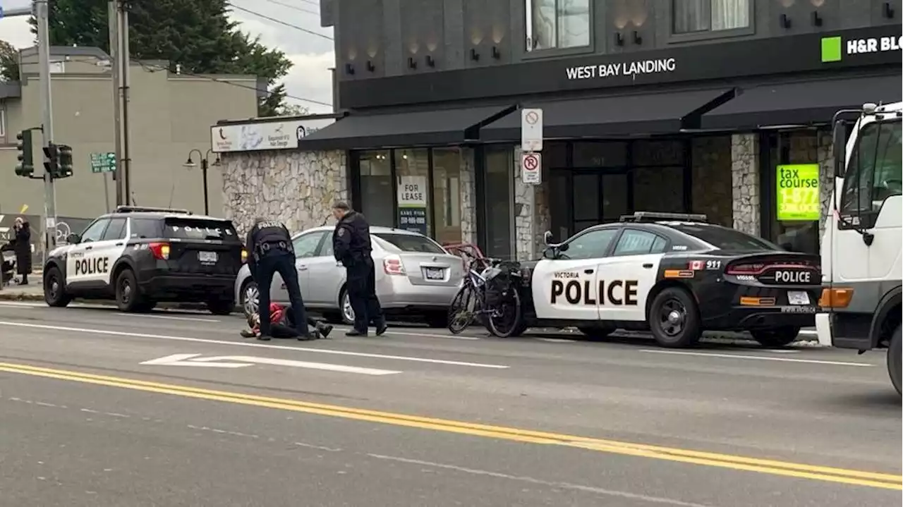 Victoria police officer 'doors' passing cyclist