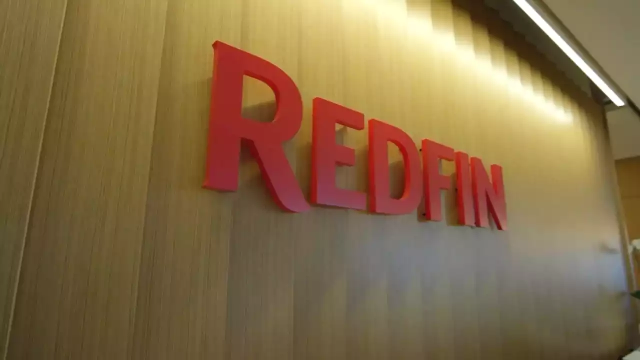 Redfin, Seattle-based real estate giant, shuts home-flipping business, cuts 13% of workforce