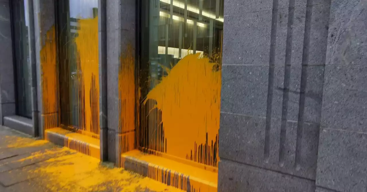 Just Stop Oil activists cover Barclays Aberdeen HQ in orange paint