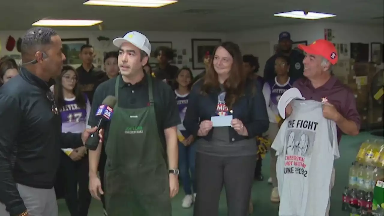 World Series wager: Joe's Deli in Houston wins bet, local school gets check