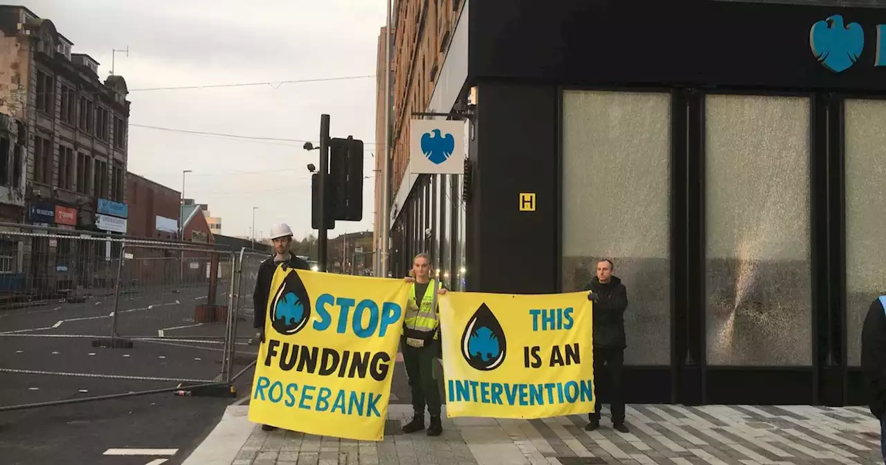 Climate activists smash windows of Barclays office in fossil fuel protest