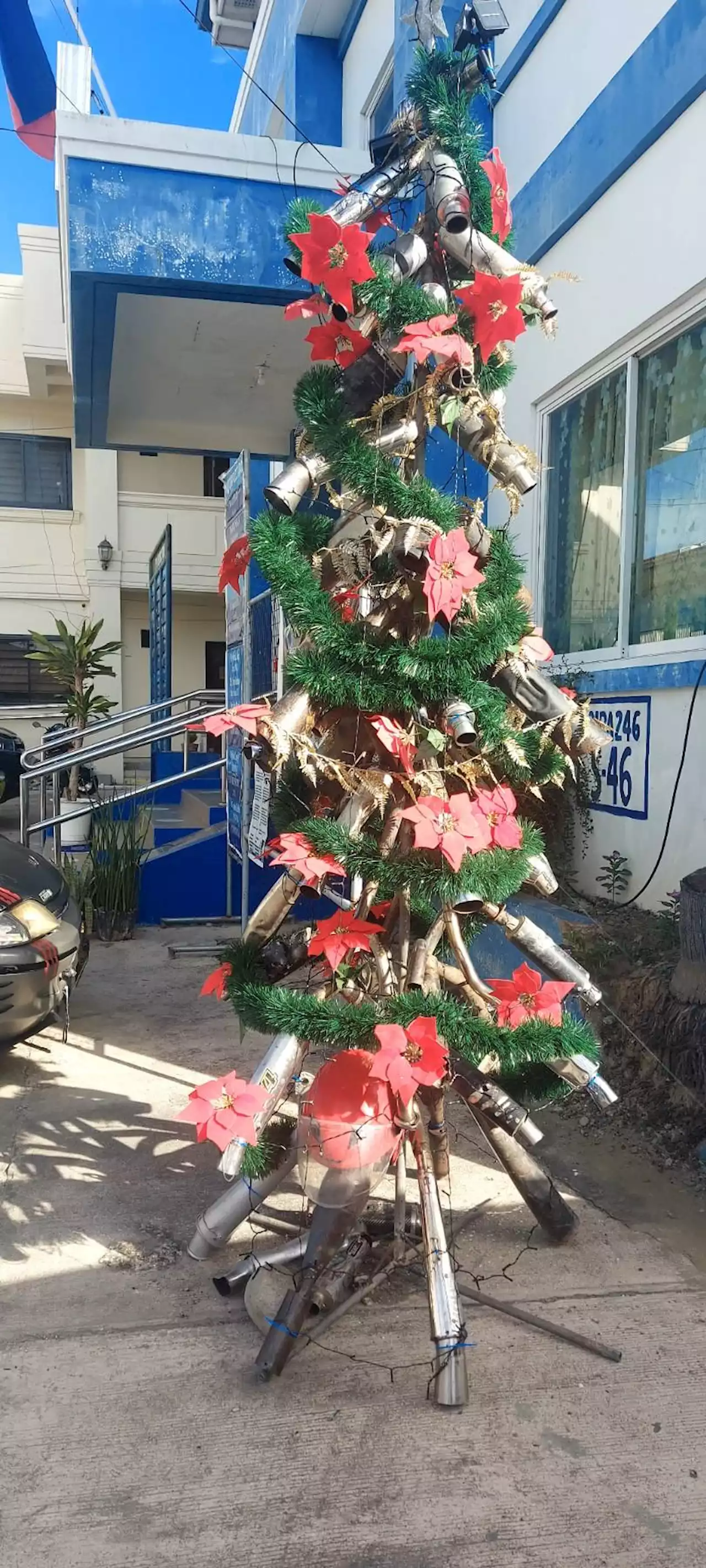 Urbiztondo PNP displays Christmas tree made of confiscated motorcycle mufflers