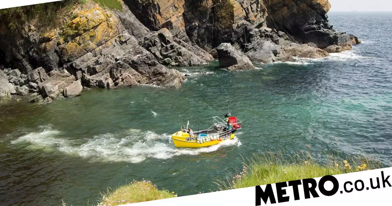 Fishermen rescued from raft after boat sank off Cornish coast