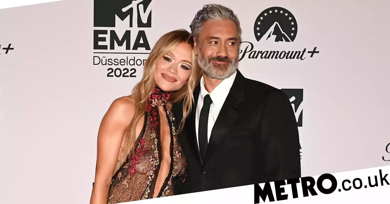 MTV EMAs hosts Rita Ora and Taika Waititi put on cosy display on red carpet