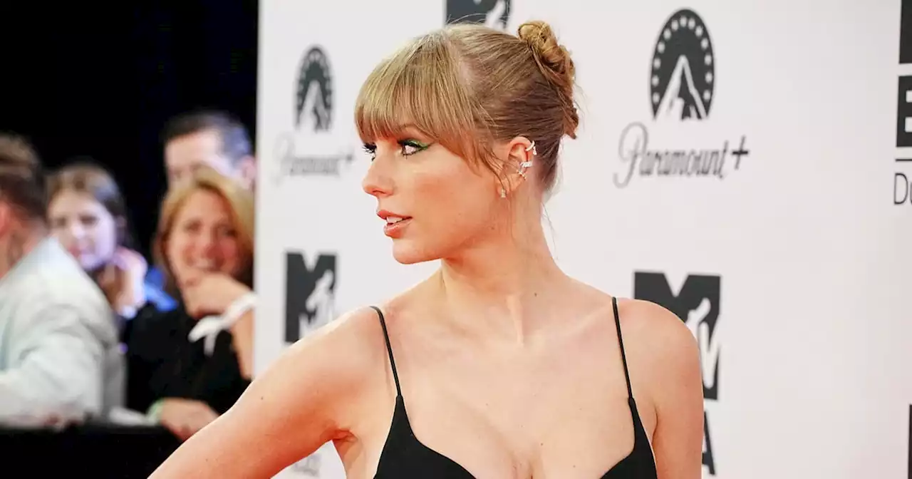 Taylor Swift Pairs a Plunging Bodysuit With a See-Through Skirt at the MTV EMAs