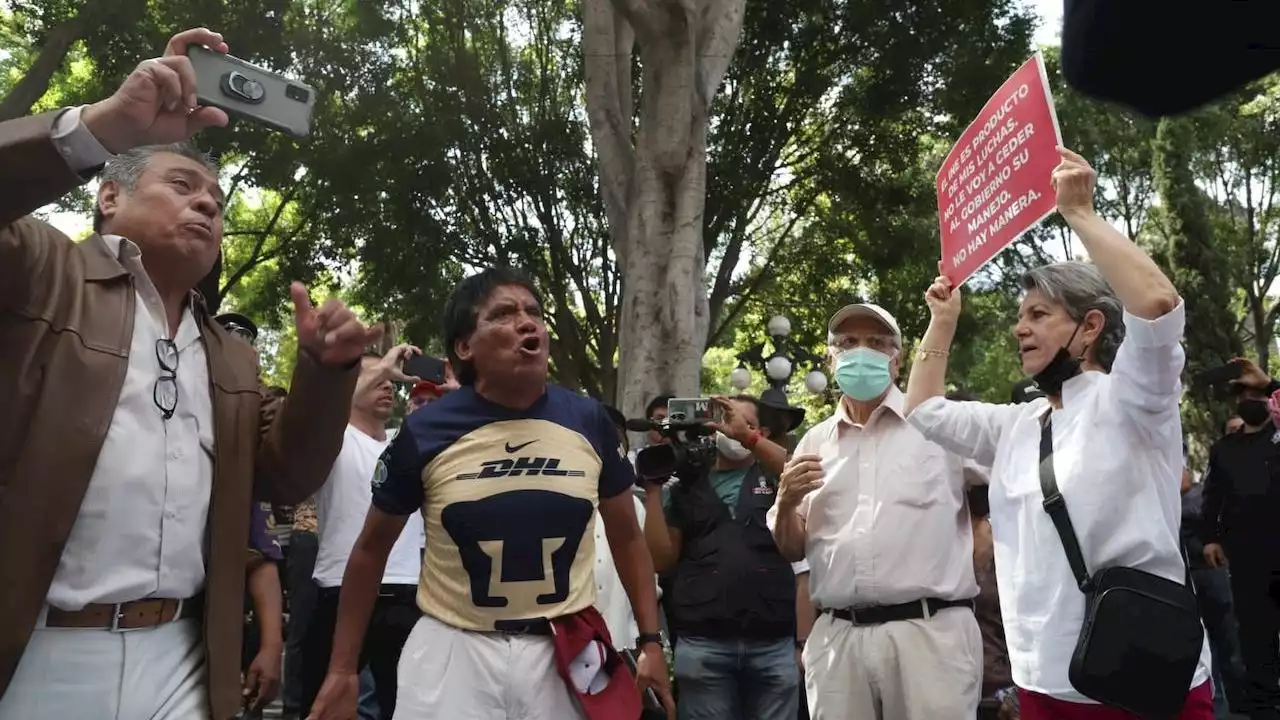 Altercado en Puebla entre marchistas y simpatizantes de AMLO (Video)