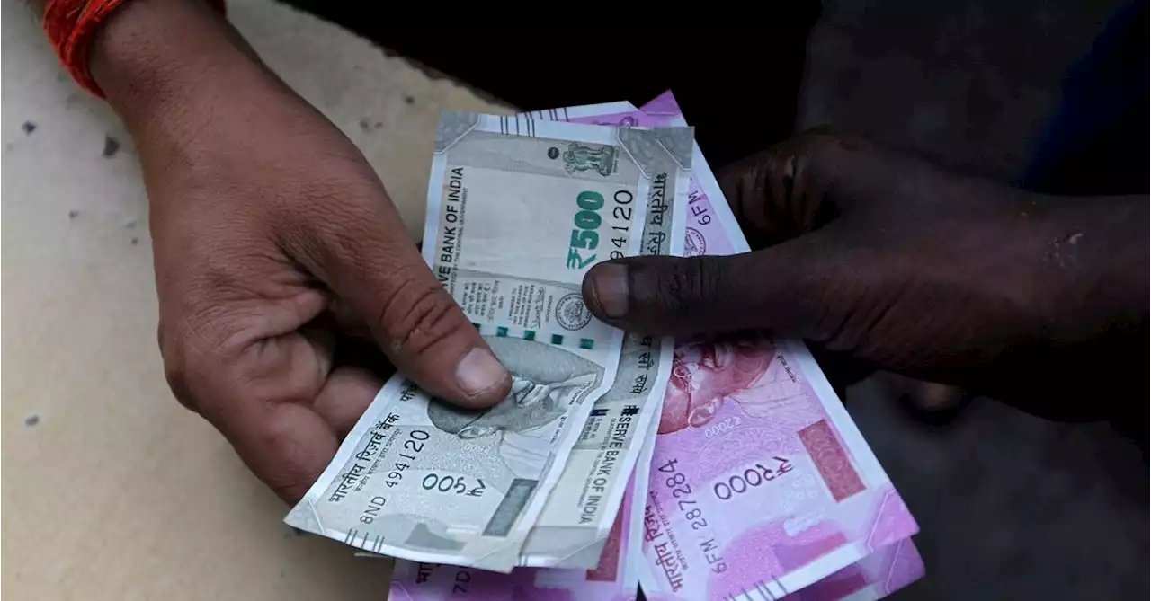 INDIA RUPEE Rupee slips below 81/USD on broad-based dollar demand