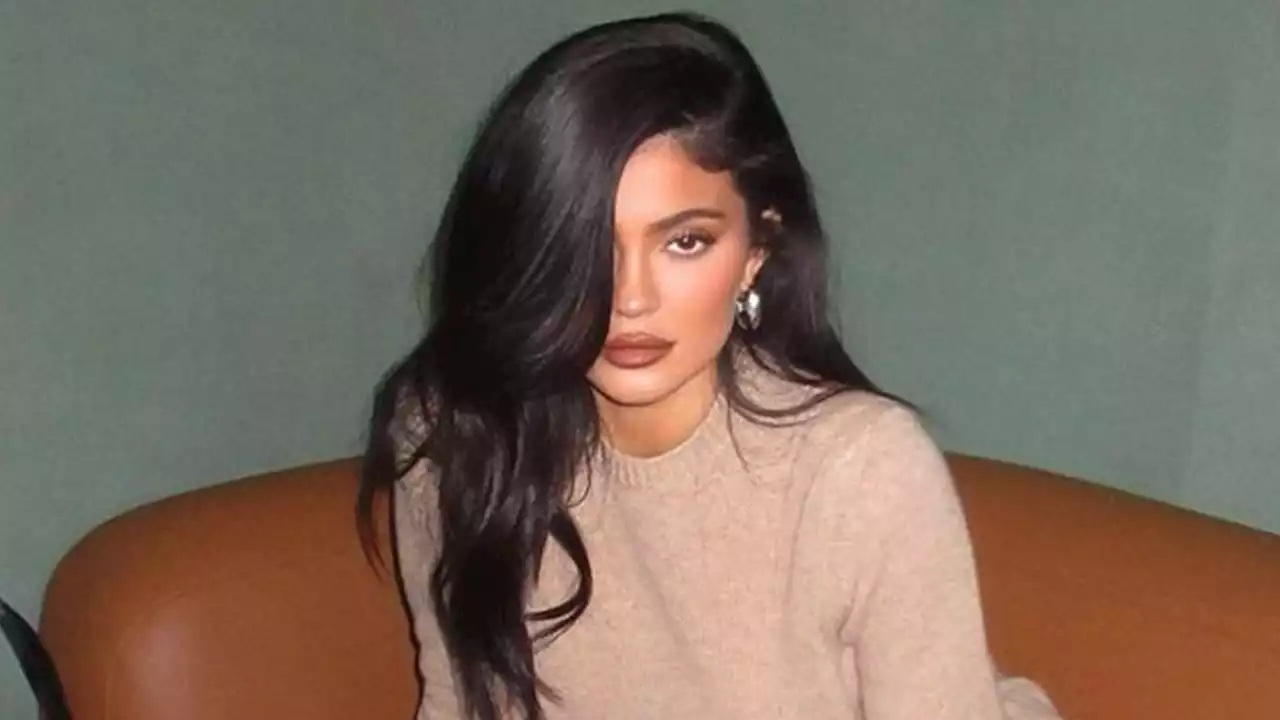 Kylie shows off bare legs in mini dress for secret never-before-seen photos