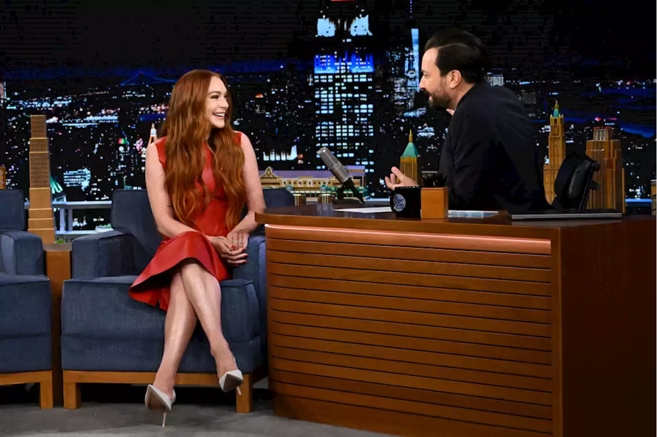 Lindsay Lohan Pops in Red Versace Dress for ‘Jimmy Fallon’ While Promoting ‘Falling for Christmas’