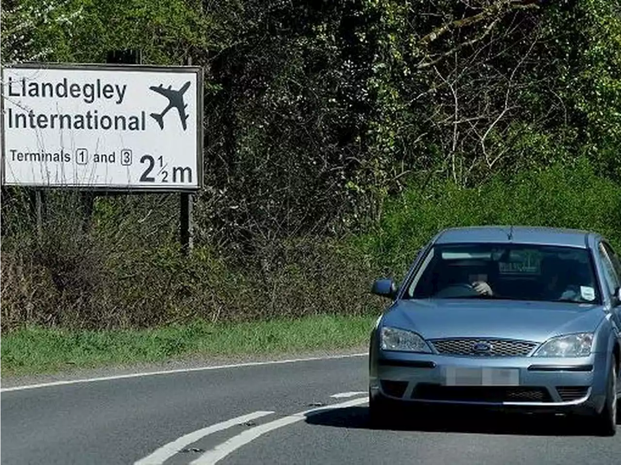 Creator behind fictitious airport sign hopes supporters can keep the gag running