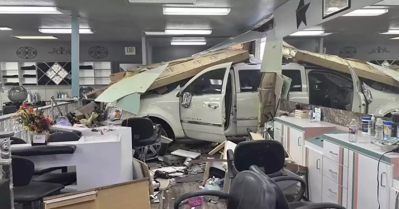 1 injured after SUV slams into Roy hair salon