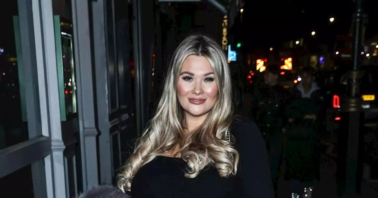 Pregnant Shaughna Phillips cradles baby bump at India Reynolds fashion launch