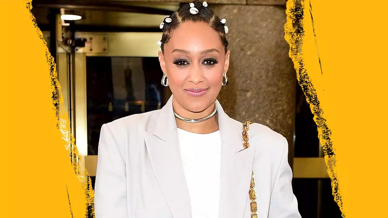 Tia Mowry wore an all-grey outfit accessorised with hair shells