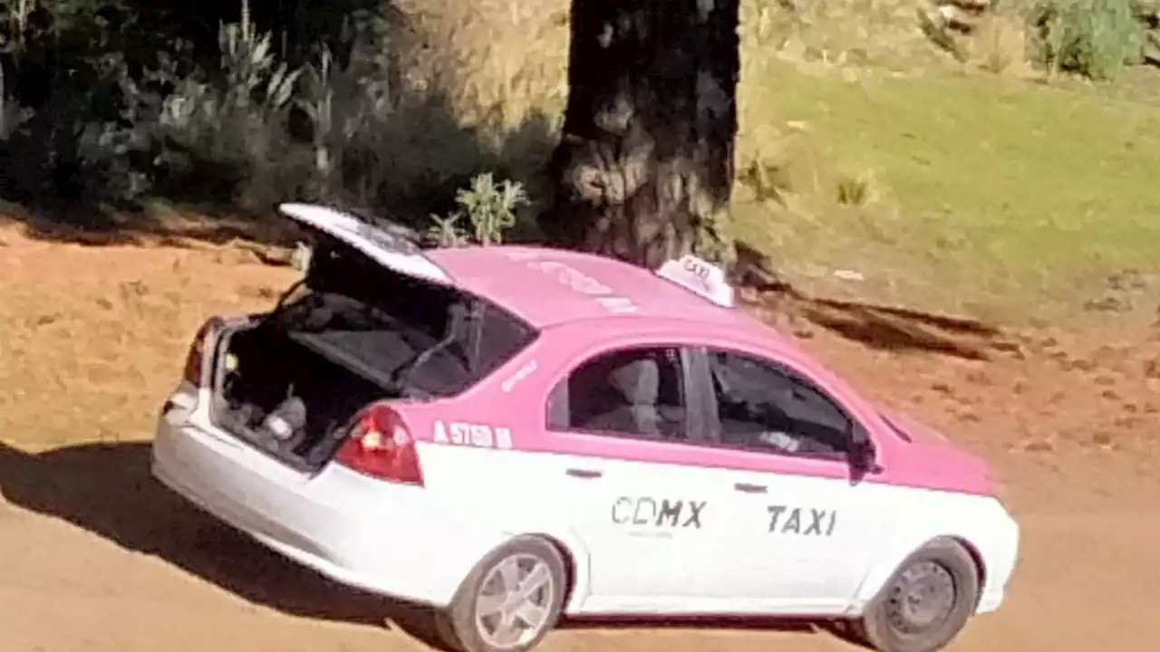 Hallan en el Ajusco dos cuerpos dentro de la cajuela de un taxi