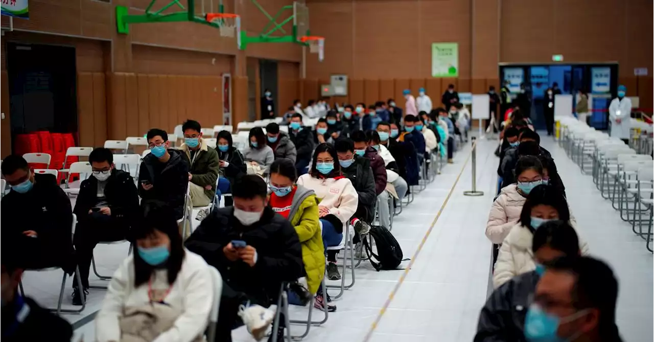 China to speed up vaccinations, build more designated COVID hospitals