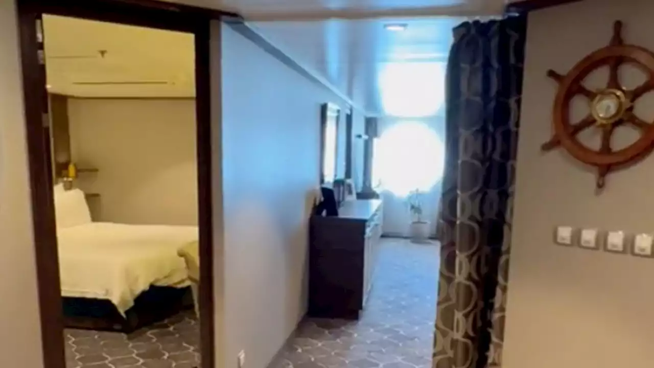 I'm a cruise captain - here's my luxury cabin with bath, walk-in closet & 55' TV