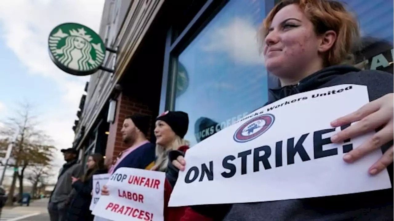 Starbucks workers walk off the job in 100 U.S. locations to push for better pay | CBC News