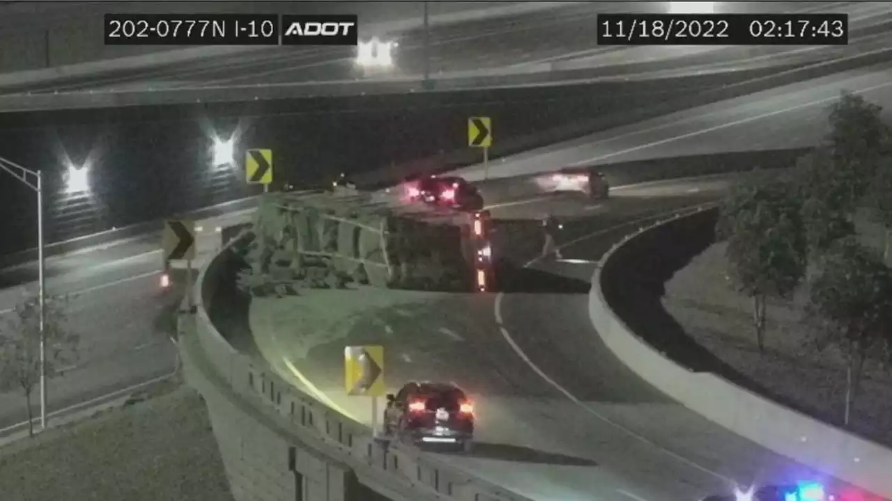 Commercial truck rolls over on Loop 202 ramp in west Phoenix, spilling hay