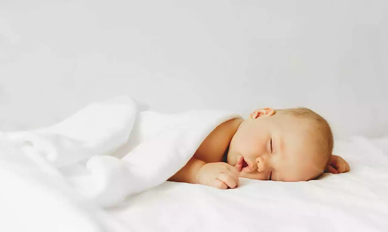 When do babies start sleeping through the night? Expert advice tired new parents need to know