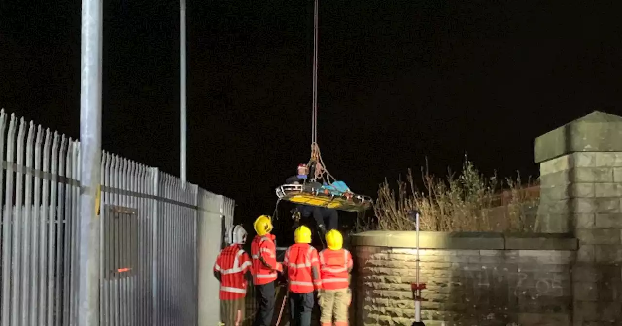 Rescue operation after woman falls 25ft onto railway sidings