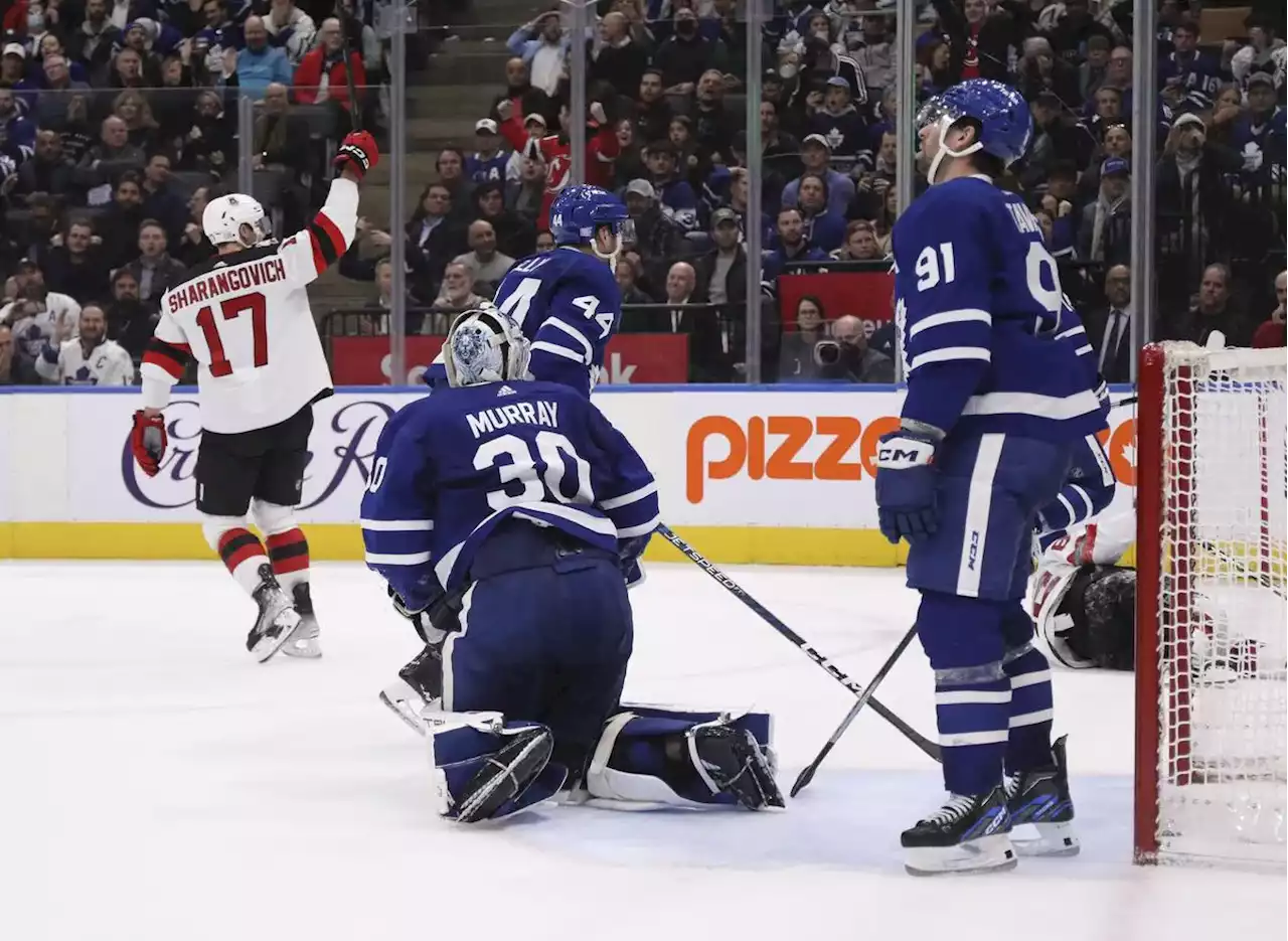 Devils beat Maple Leafs in overtime for 11th straight win