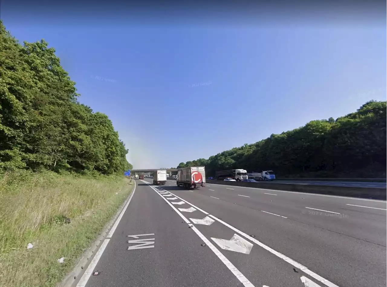 Lanes closed on M1 for hours after vehicle smashes through central reservation