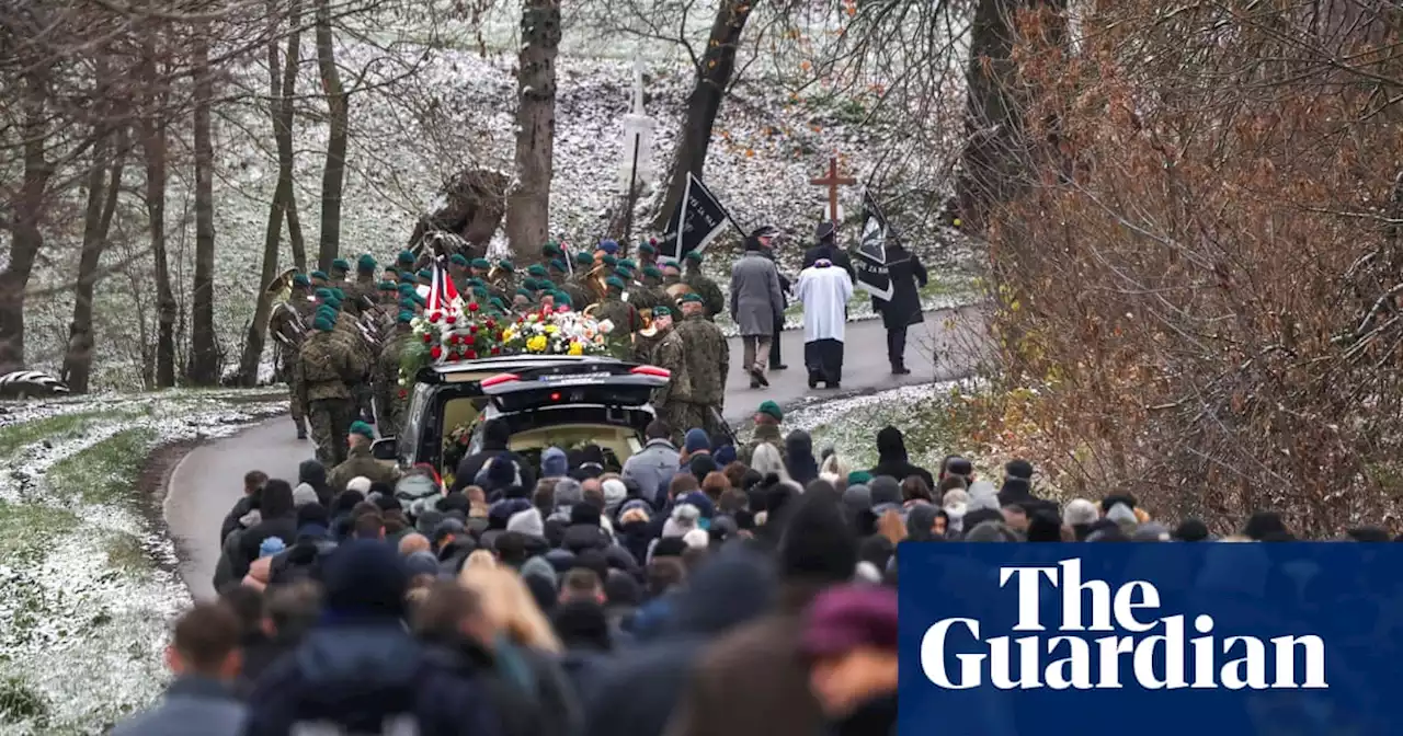 Polish villagers bury man killed in missile blast near Ukrainian border