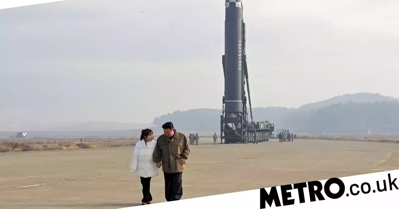 Kim Jong Un's daughter seen for first time accompanying him to missile launch