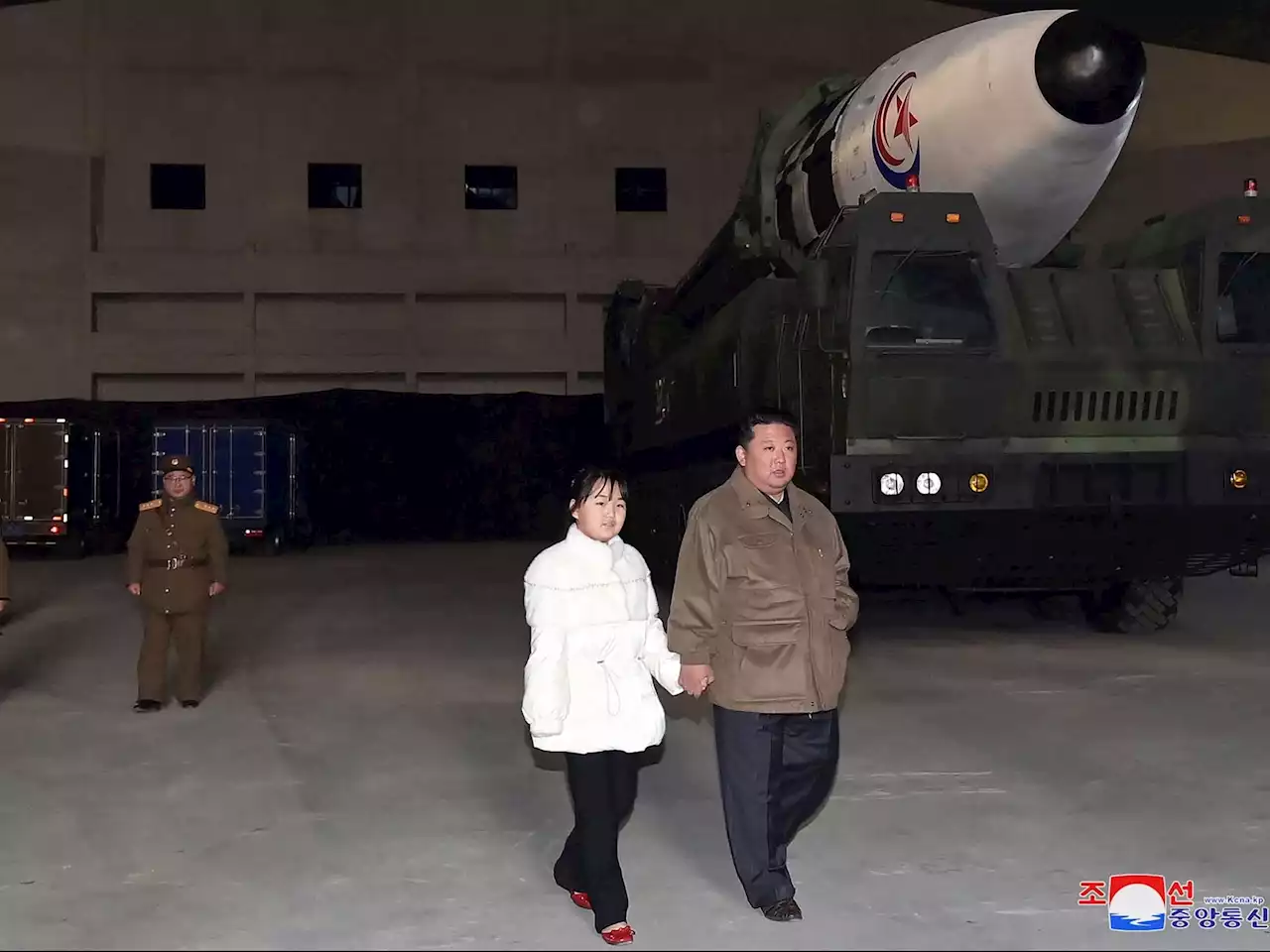 North Korea's Kim reveals daughter at missile test, says ICBM has capacity to contain U.S. threats