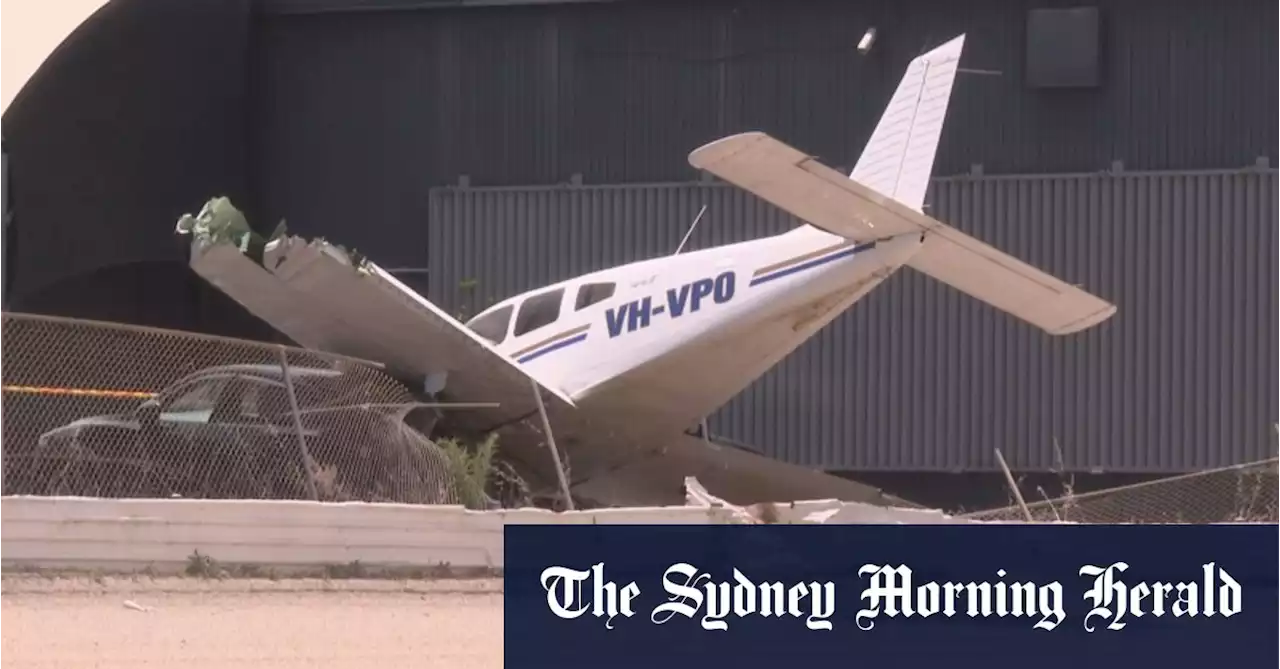 Pilot escapes injury after plane crashes into fence, car at Bankstown
