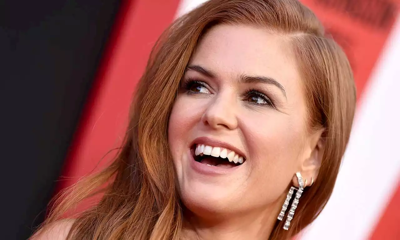 Isla Fisher channels movie magic in racy ruffled dress