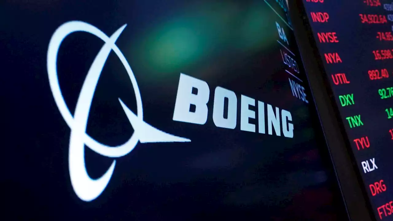 Boeing execs try to calm investors after multi-billion dollar loss