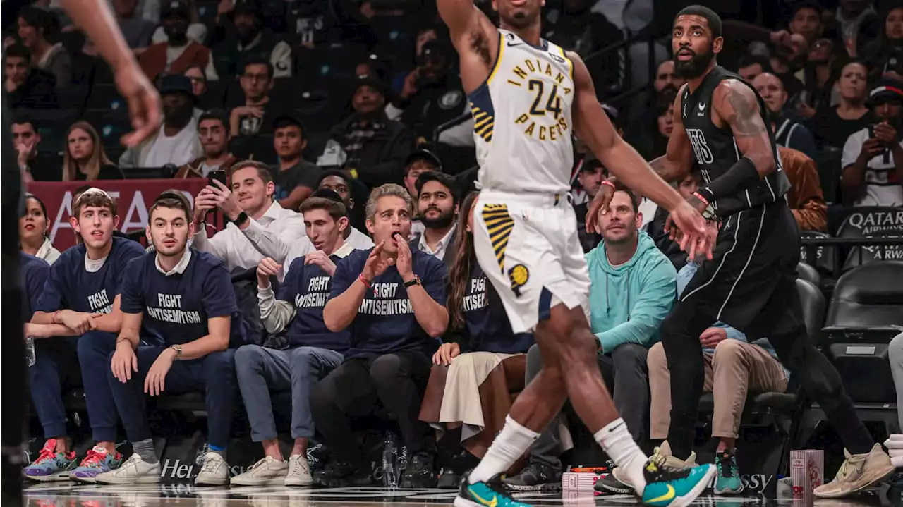 Kyrie Makes Sarcastic Quip to Courtside Group in ‘FIGHT ANTISEMITISM’ Shirts