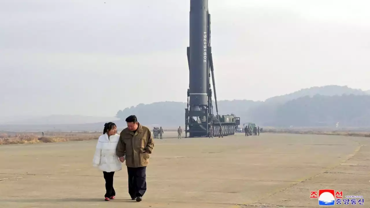 North Korea unveils daughter of Kim Jong Un at missile launch site