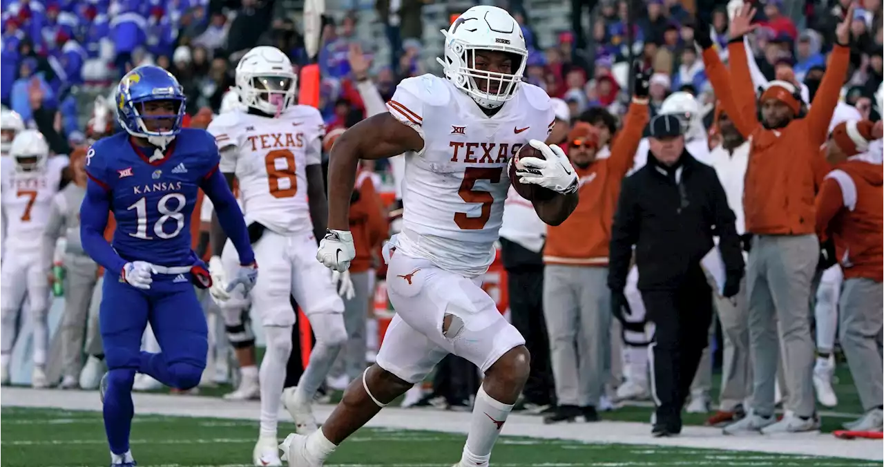 Star RB Bijan Robinson has career day as Texas routs Kansas