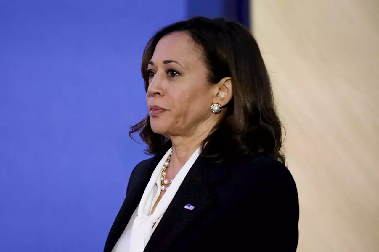 Did Kamala Harris Introduce Herself as 'a Woman Sitting at the Table' in a ‘Blue Suit’?