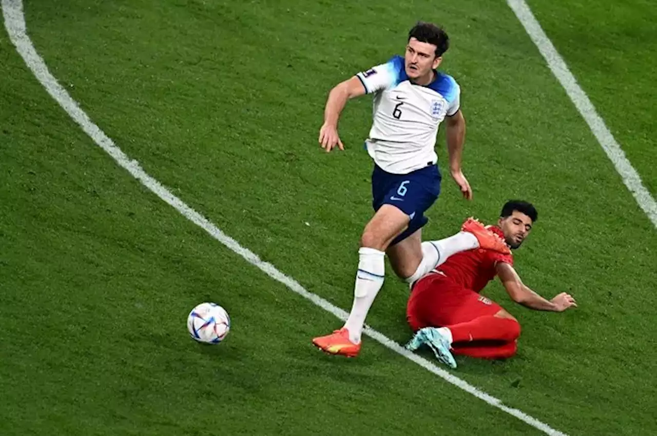 Piala Dunia 2022 - Harry Maguire Jadi Bahan Ejekan Pendukung Iran Lewat Spanduk - Bolasport.com