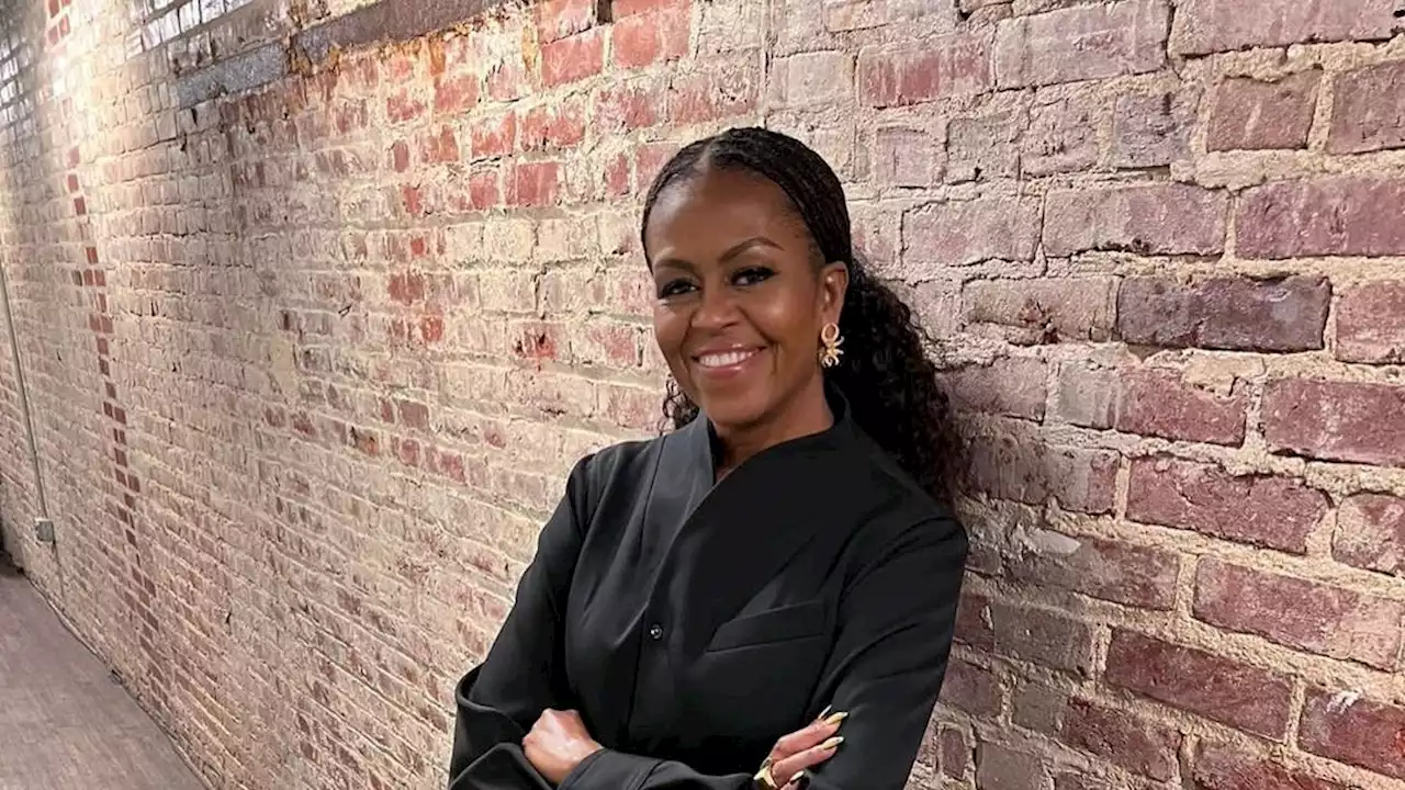 Michelle Obama Adds New Bottega To Her “Bestselling Author” Wardrobe