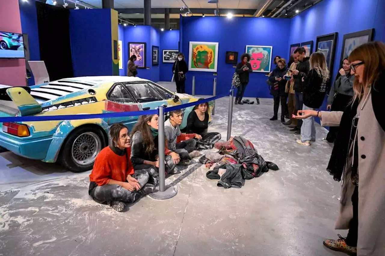 Climate activists throw flour onto Warhol-painted BMW