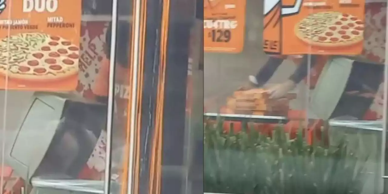 Captan a empleado de Little Caesars sacando cajas de la basura ¿para volverlas a usar? (VIDEO)