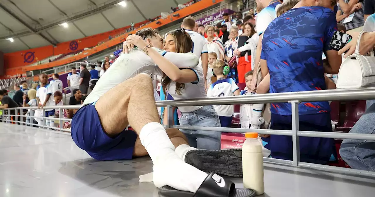 Jack Grealish hugs girlfriend Sasha Attwood as he celebrates England's 6-2 win