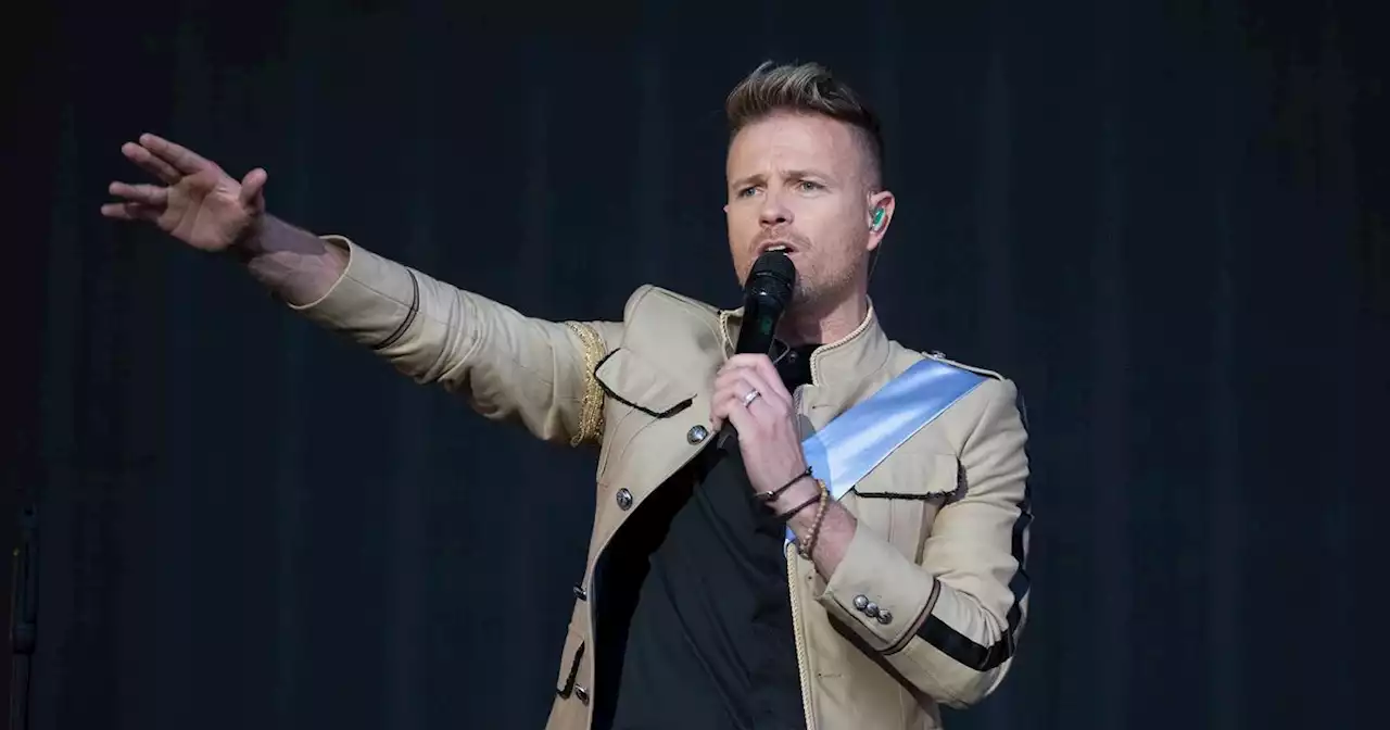 Westlife's Nicky Byrne says he's 'battered and bruised' after falling off stage