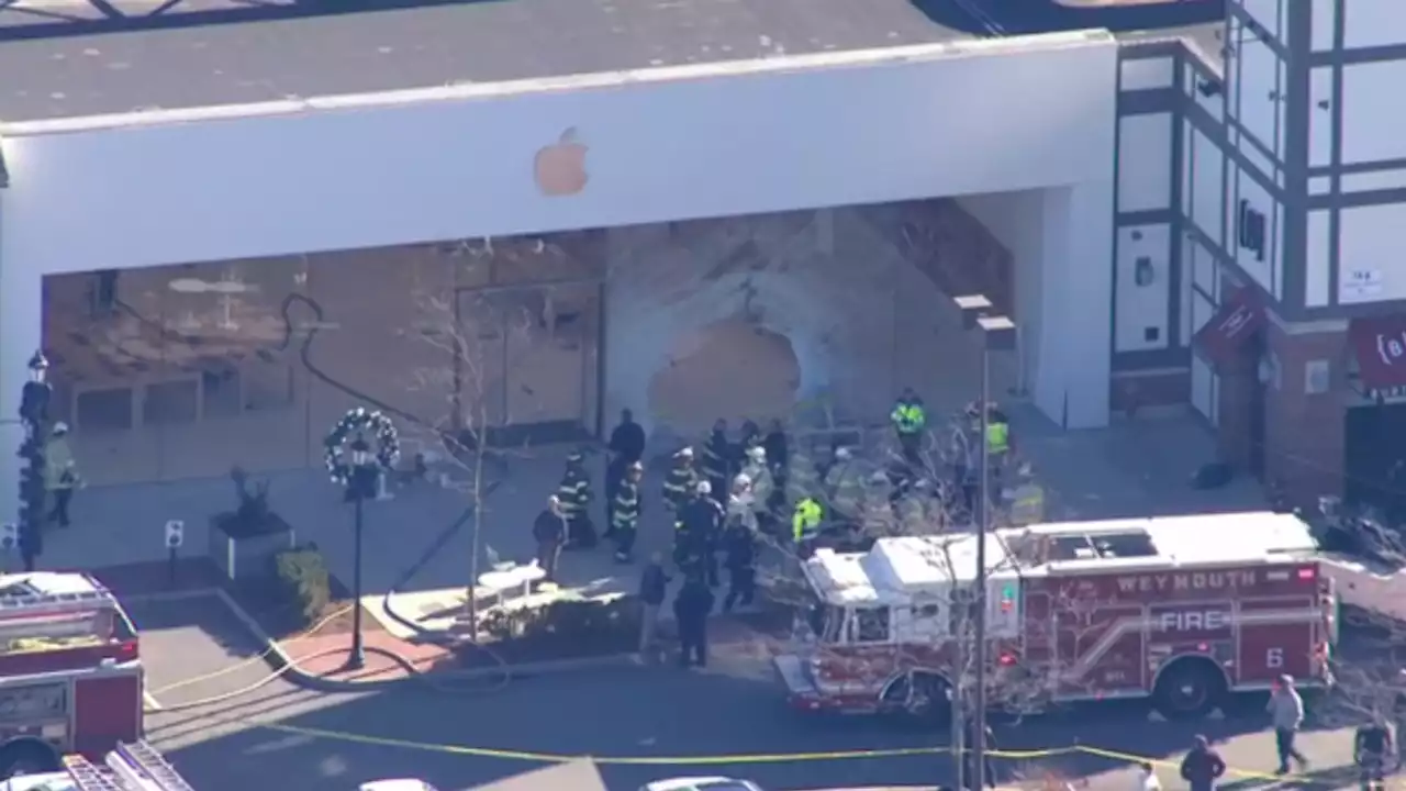 Several trapped after car crashes into Apple store in Massachusetts