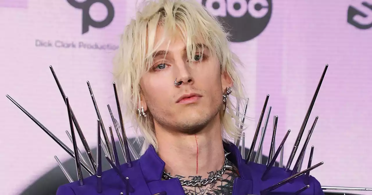 Ouch! Machine Gun Kelly Attends 2022 AMAs Solo — and Covered in Spikes